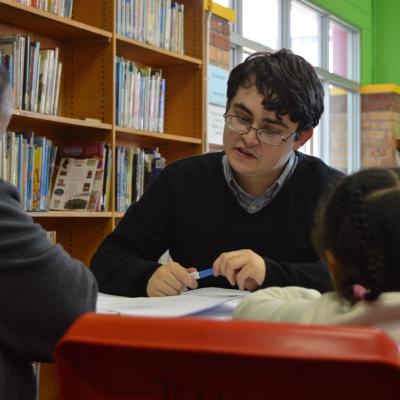 A Law and Human Rights volunteer assists at a legal clinic Legal clinic in session in Mitchells Plain, Cape Town